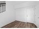Inviting entryway with hardwood floors and neutral walls at 2676 W 68Th Ave, Denver, CO 80221