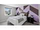 Cozy bedroom with natural light, stylish decor, and comfortable furnishings at 8721 W 86Th Ave, Arvada, CO 80005