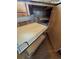 Spacious kitchen cabinet featuring convenient pull-out shelving for easy storage at 8721 W 86Th Ave, Arvada, CO 80005