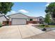 Charming single-story home featuring a large driveway and easy to maintain rock and lawn at 8721 W 86Th Ave, Arvada, CO 80005