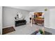 Spacious living room with open access to the kitchen and dining area, perfect for entertaining at 8721 W 86Th Ave, Arvada, CO 80005