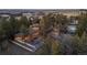 Aerial view of house, pool, and surrounding landscape at 7076 Inspiration Dr, Parker, CO 80138