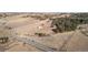 Aerial view showing house, property lines, and surrounding landscape at 7076 Inspiration Dr, Parker, CO 80138