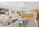 Finished basement with built-in bar and comfortable seating at 7076 Inspiration Dr, Parker, CO 80138
