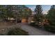 A home with mature trees, privacy, and a long driveway welcomes you in this unique home at 7076 Inspiration Dr, Parker, CO 80138