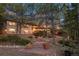 Home's front exterior with walkway and landscaping at 7076 Inspiration Dr, Parker, CO 80138