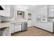 Kitchen boasts stainless steel dishwasher and access to backyard at 7076 Inspiration Dr, Parker, CO 80138