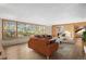 Bright living room with large windows and comfortable seating at 7076 Inspiration Dr, Parker, CO 80138