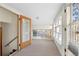 Bright sunroom with window seat and view at 7076 Inspiration Dr, Parker, CO 80138