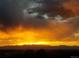 Stunning sunset over mountain range at 7076 Inspiration Dr, Parker, CO 80138