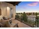 Spacious balcony with seating area and views of the neighborhood at 7022 Homeplace St, Castle Rock, CO 80108