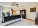 Bright main bedroom with vaulted ceilings, large dresser, and decor at 13330 York Way, Thornton, CO 80241