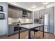 Well-lit kitchen with stainless steel appliances, center island and plenty of counter space at 1750 Wewatta St # 627, Denver, CO 80202
