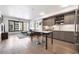 Open-concept living space featuring hardwood floors, modern decor and stainless steel appliances at 1750 Wewatta St # 627, Denver, CO 80202