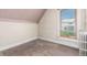 Small bedroom displaying painted trim, patterned border along the ceiling, and original wooden floors at 931 E 17Th Ave, Denver, CO 80218