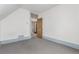 Carpeted bedroom showing an open wooden door frame and freshly painted walls and trim at 931 E 17Th Ave, Denver, CO 80218