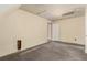 Spacious bedroom features hardwood floors, neutral paint, and a door to the hall at 931 E 17Th Ave, Denver, CO 80218