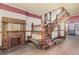 Grand foyer featuring a decorative staircase and fireplace at 931 E 17Th Ave, Denver, CO 80218