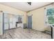 Open kitchen layout with ample storage and updated refrigerator at 931 E 17Th Ave, Denver, CO 80218