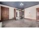 Large living room with blue ceiling, original wood trim, and wood doors at 931 E 17Th Ave, Denver, CO 80218