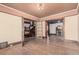 Spacious living room with hardwood floors, vintage doors, and traditional architectural features at 931 E 17Th Ave, Denver, CO 80218