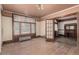Bright living room featuring hardwood floors, vintage fireplace, and a large window at 931 E 17Th Ave, Denver, CO 80218