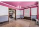 Spacious living room showcasing original hardwood floors and period details at 931 E 17Th Ave, Denver, CO 80218