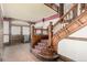 Elegant staircase featuring wood banisters, ornate detailing, and a classic design at 931 E 17Th Ave, Denver, CO 80218