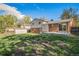 Spacious backyard with shed and patio at 9345 W Iowa Pl, Lakewood, CO 80232