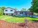 Beautifully landscaped front yard leads to this charming home at 11569 W 27Th Ave, Lakewood, CO 80215