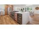 Gourmet kitchen features a large island with a wine fridge and professional-grade oven at 11569 W 27Th Ave, Lakewood, CO 80215