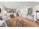 Spacious living room boasting hardwood floors, neutral decor, and natural light at 11569 W 27Th Ave, Lakewood, CO 80215