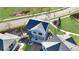 Aerial view of a home showcasing its well-maintained exterior, roof, and surrounding landscape at 17908 E 54Th Ave, Denver, CO 80249