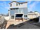 Spacious backyard featuring a balcony, patio area, and landscaping ready for customization at 17908 E 54Th Ave, Denver, CO 80249