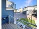 Charming street view with modern townhomes, landscaped yards, and convenient garage access at 17908 E 54Th Ave, Denver, CO 80249