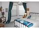 Bedroom with window, decor, and a comfortable bed with pillows and a coverlet at 7824 S Zante Ct, Aurora, CO 80016