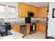 Modern kitchen with granite countertops, stainless steel appliances, and ample cabinet space at 7824 S Zante Ct, Aurora, CO 80016