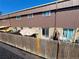 Backyard featuring a wooden fence, patio, and grill area at 5677 S Lowell Blvd, Littleton, CO 80123