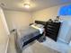 Cozy bedroom with carpet and a comfortable queen-sized bed at 5677 S Lowell Blvd, Littleton, CO 80123