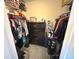 Walk-in closet with plenty of space for hanging clothes and storing personal items at 5677 S Lowell Blvd, Littleton, CO 80123