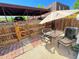 Private fenced patio with outdoor furniture, perfect for relaxation and entertaining at 5677 S Lowell Blvd, Littleton, CO 80123
