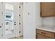 Bright entryway features a back door that opens to a balcony with exterior community views at 8376 Cokedale Dr, Littleton, CO 80125