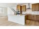 Well-designed kitchen featuring a center island, modern appliances, and stylish cabinetry at 8376 Cokedale Dr, Littleton, CO 80125