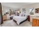Bright bedroom features a window and closet at 2428 Concord Cir, Lafayette, CO 80026