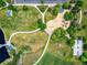 Overhead view of a park featuring a pond, playground, basketball court, and walking trails at 5451 W 73Rd Ave, Westminster, CO 80003