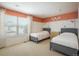 Charming bedroom with twin beds and a bright accent wall at 5451 W 73Rd Ave, Westminster, CO 80003