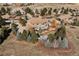 Majestic home surrounded by lush landscaping and mature trees, creating a private oasis at 5582 Twilight Way, Parker, CO 80134