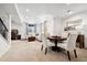 Finished basement featuring a living area with comfortable seating and a dining area at 5582 Twilight Way, Parker, CO 80134