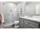 Beautifully designed bathroom with a glass-enclosed shower and modern vanity with ample storage at 5582 Twilight Way, Parker, CO 80134
