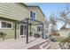 Backyard deck features a pergola, hot tub, shed, and offers space for relaxation and entertainment at 19357 E 40Th Ave, Denver, CO 80249